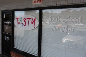 Greenville Vinyl Signs, Graphics, & Banners vinyl storefront window door 300x200